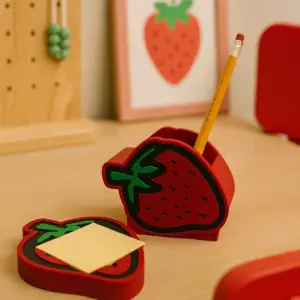 Strawberry shaped pen holder with matching 3D printed notepad tray.