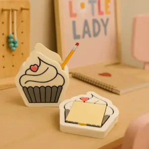 Cupcake-shaped pen holder with matching notepad tray.